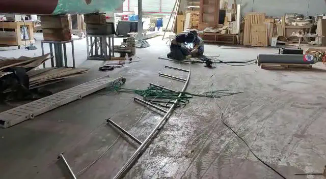 A section of the stainless steel handrail being welded.