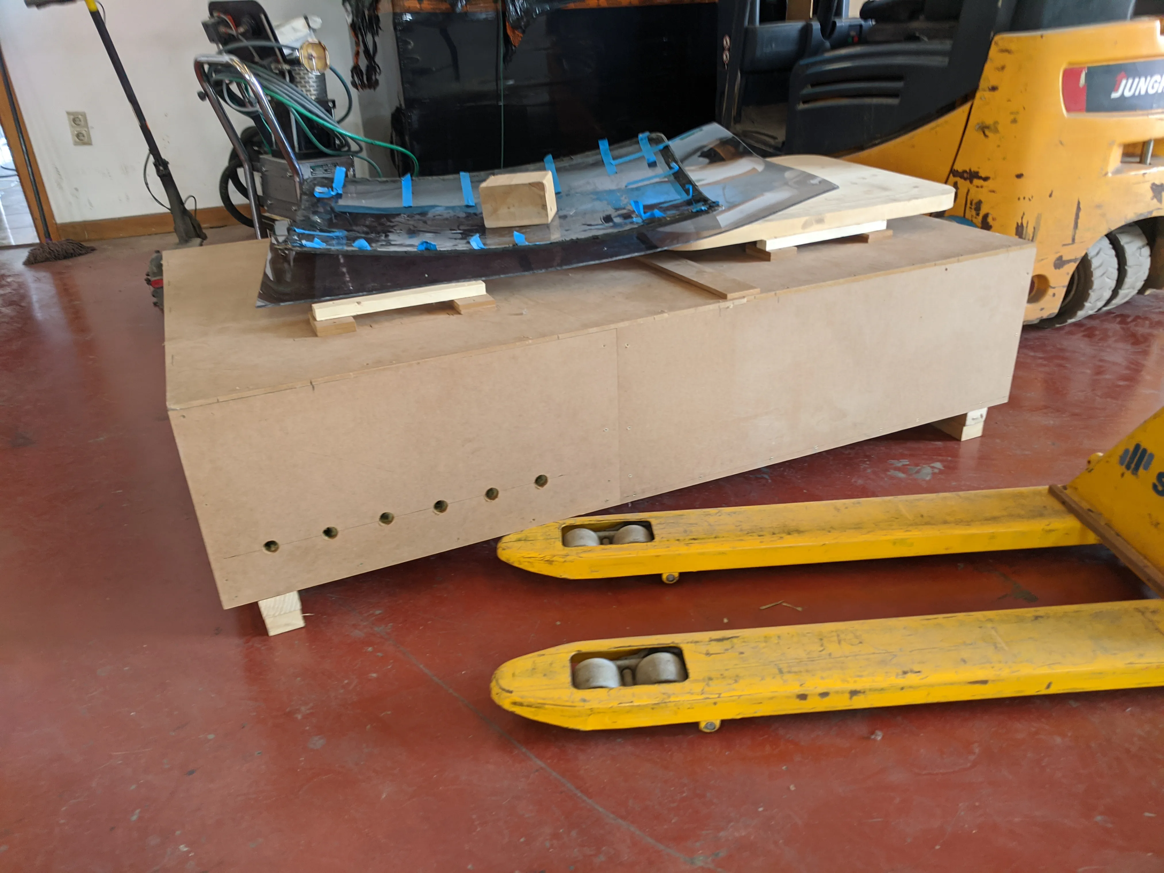 A custom-built oven to heat the methacrylate sheets.