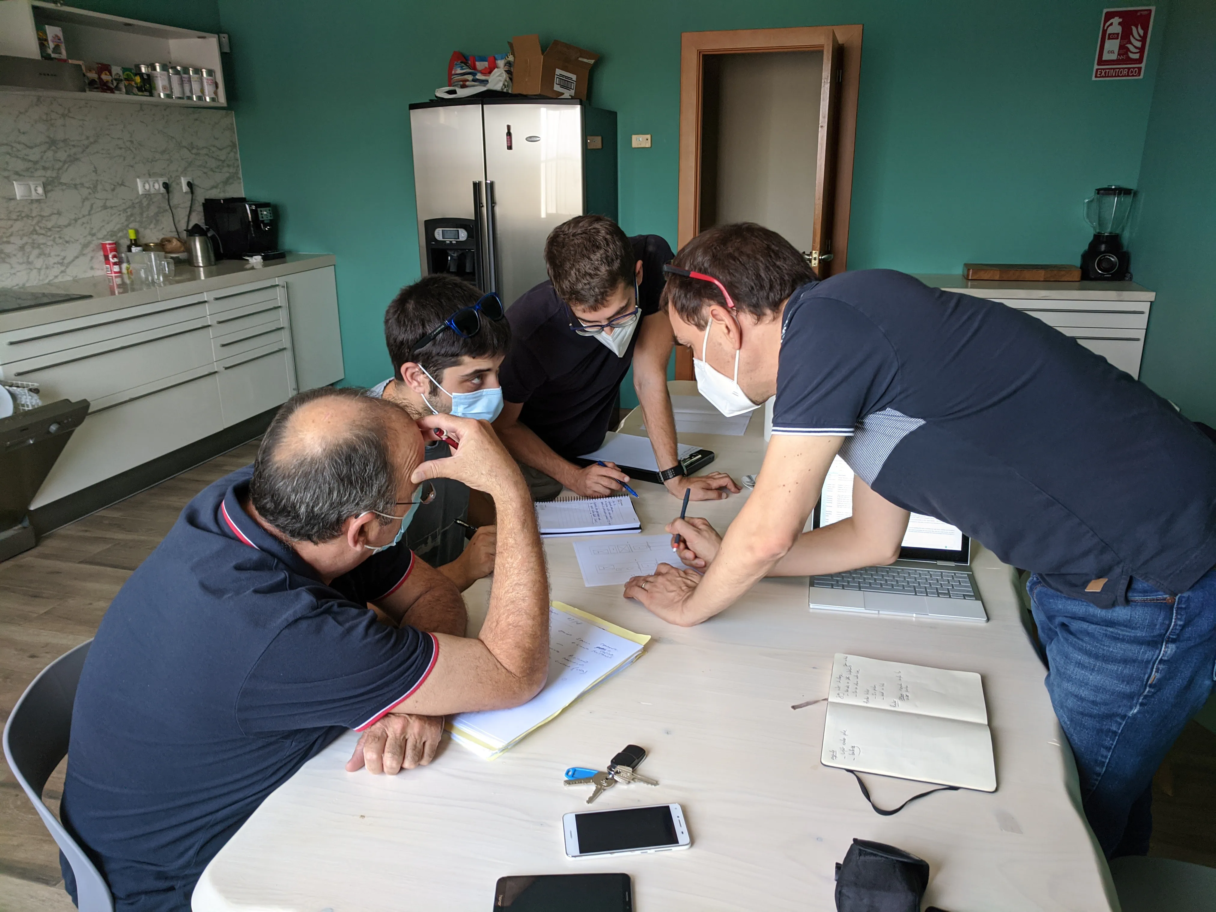 The technical project team in a planning meeting at the shipyard.