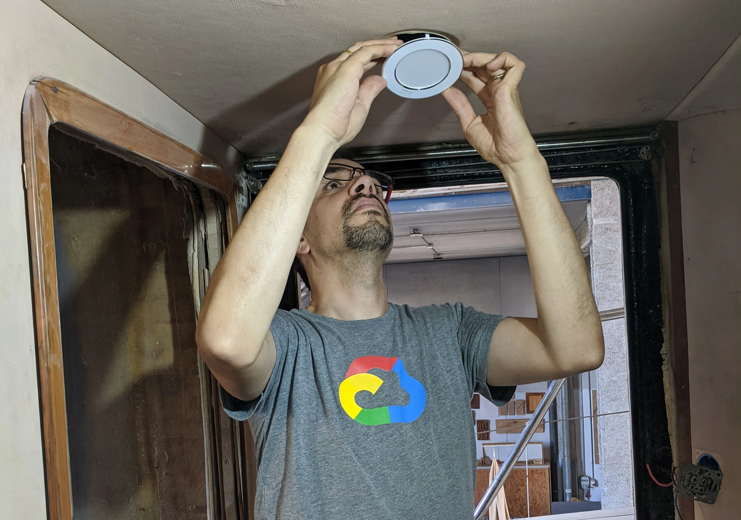 A new LED light fixture installed on the ceiling.