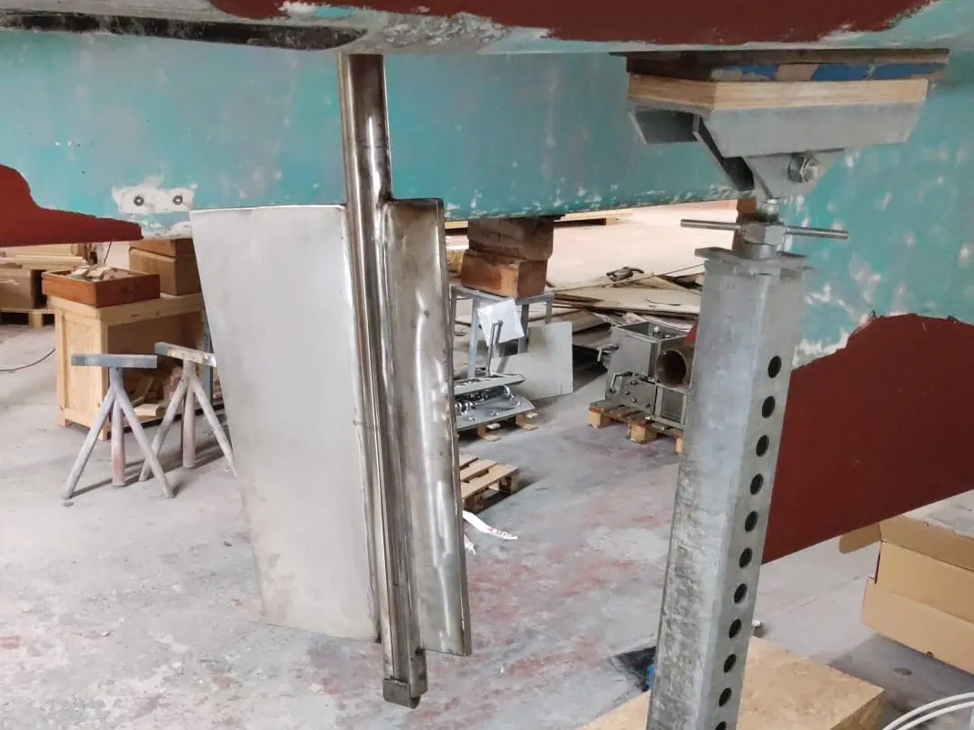 New Starboard Rudder The new starboard stainless steel rudders installed on the hull.