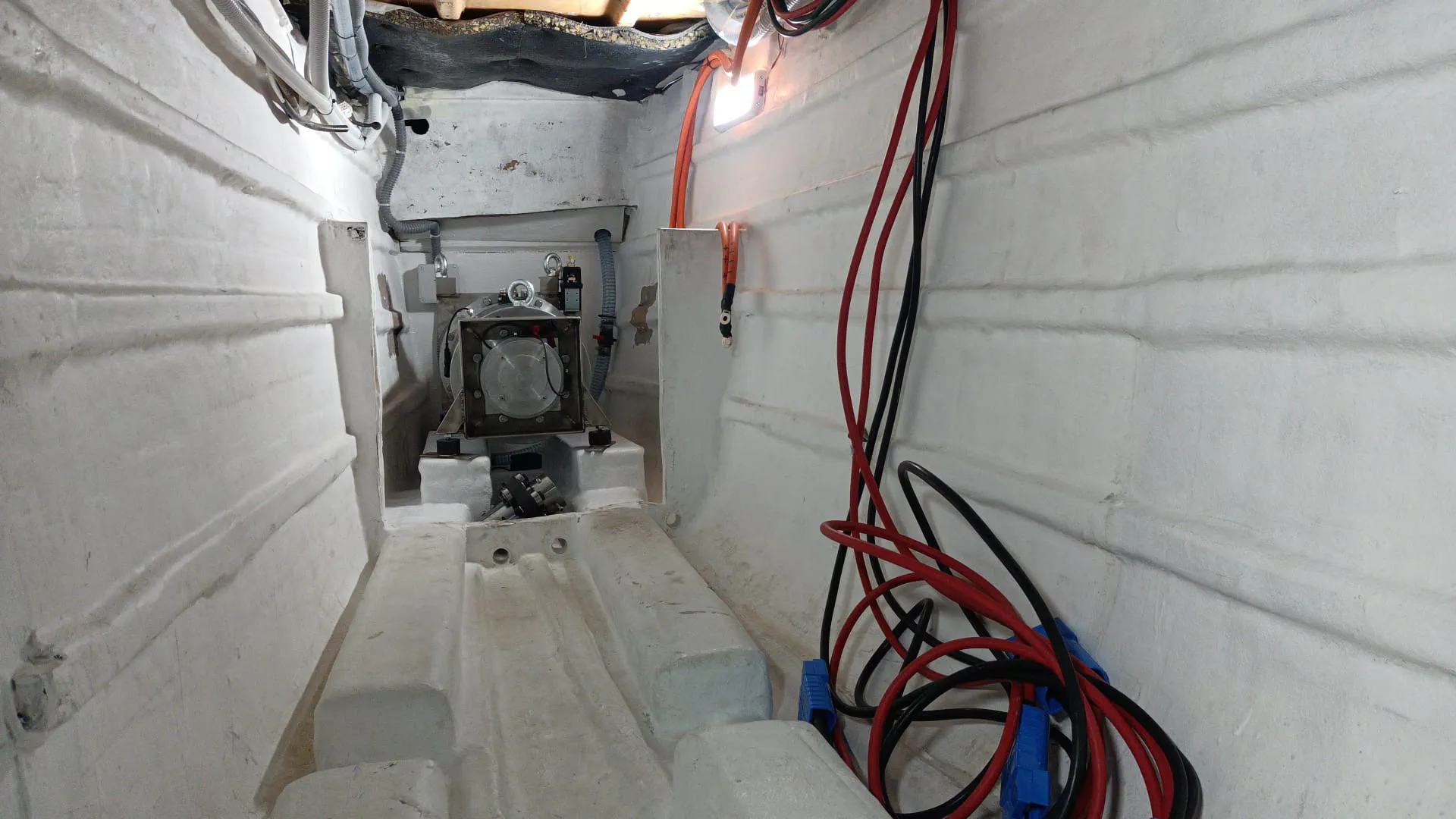 The port electric motor installed on its support.