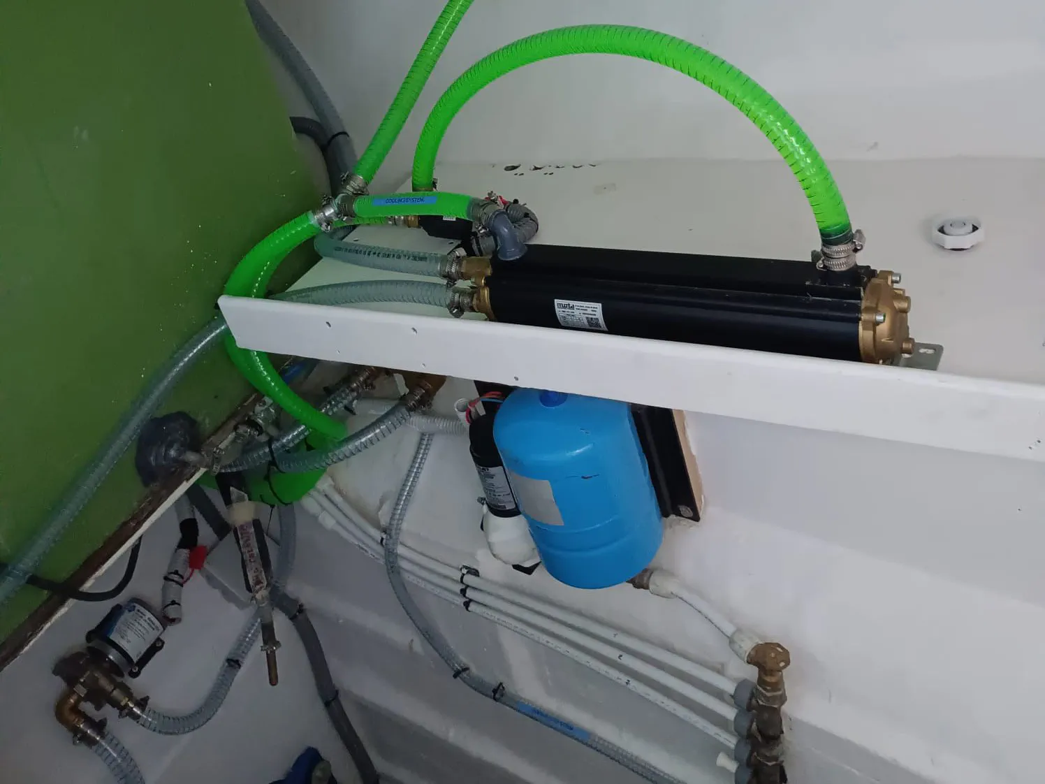 The relocated seawater pump installed below the waterline to ensure proper operation.