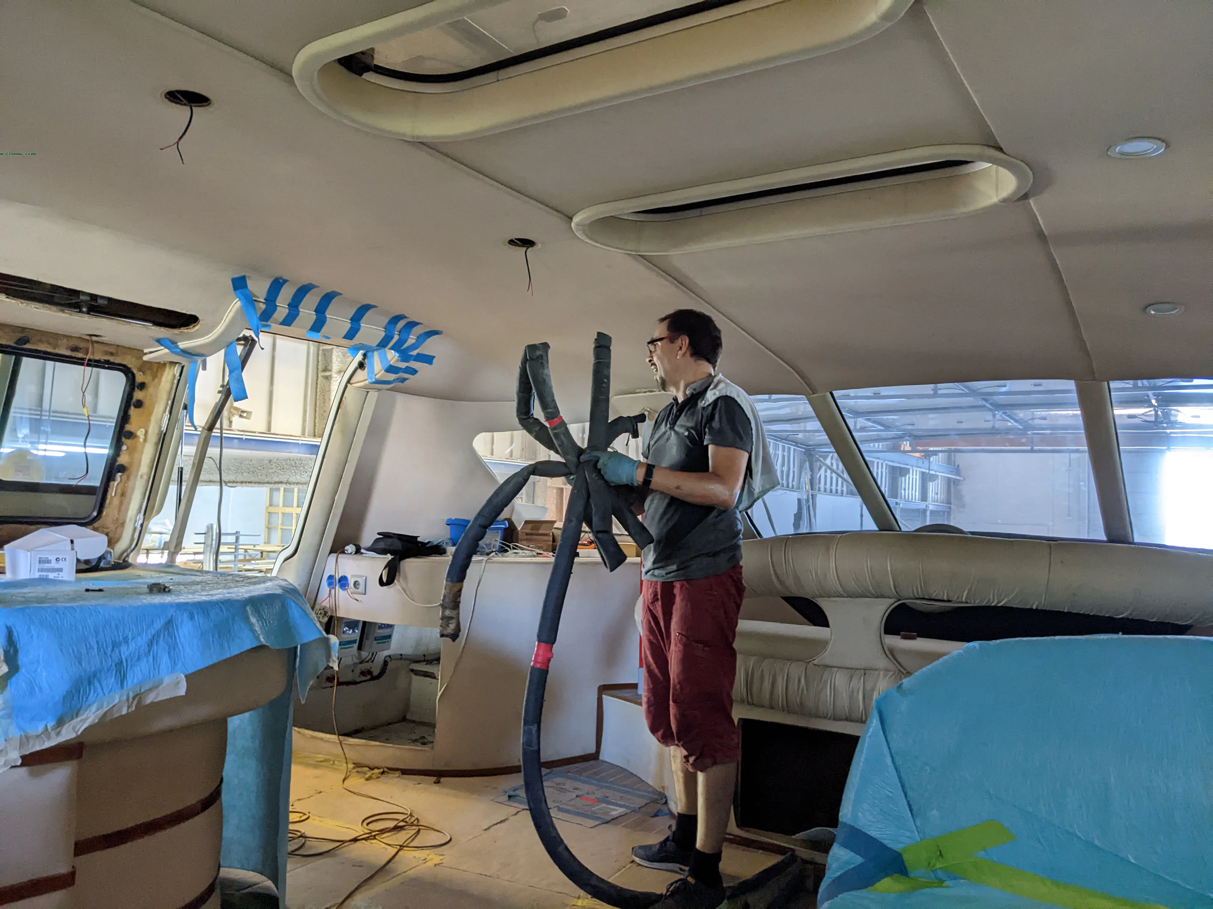 Pipes Removal Removing old air conditioning system pipes.