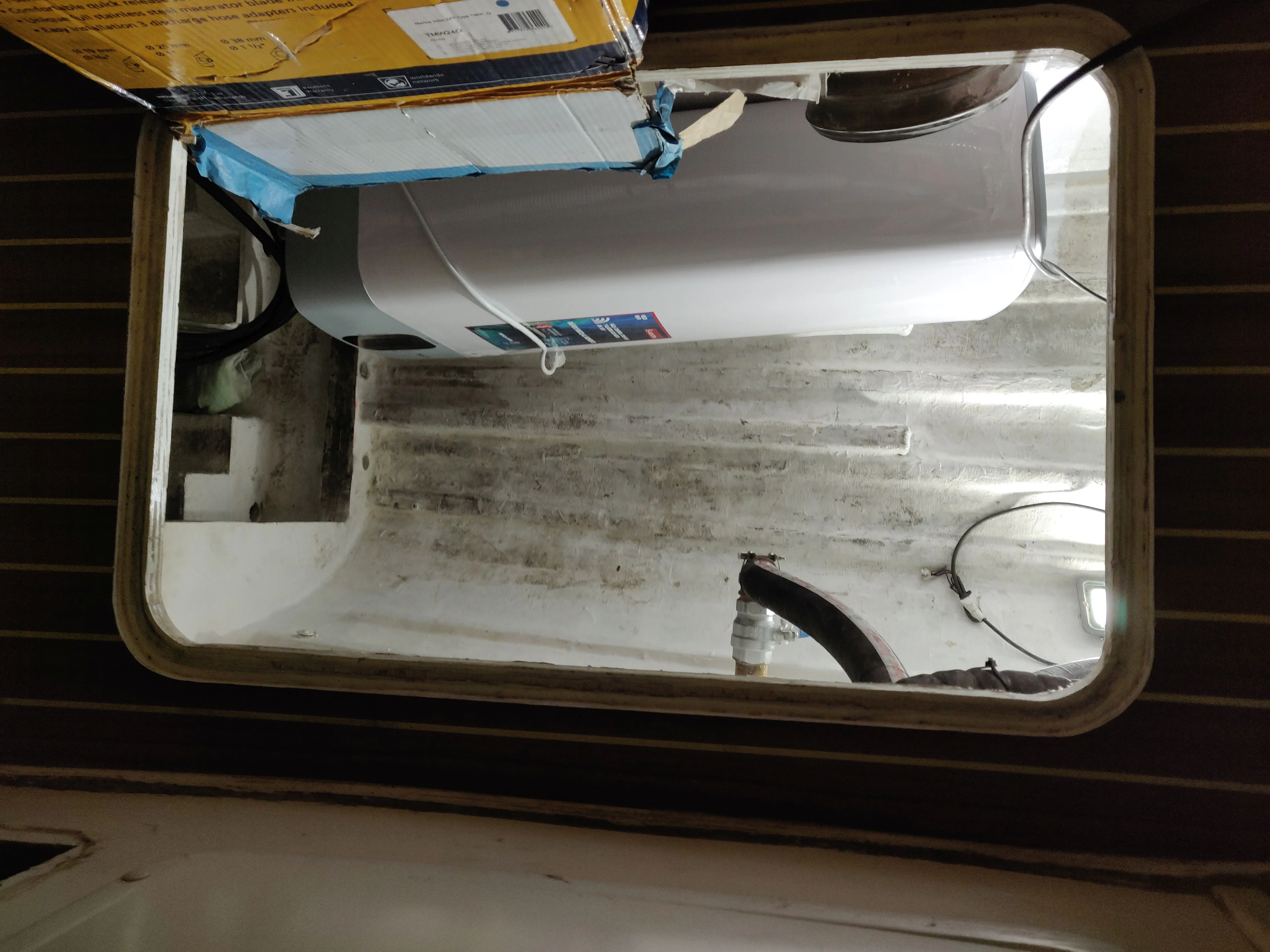 Water Heater Installation New 80-liter water heater installed in the bilge.