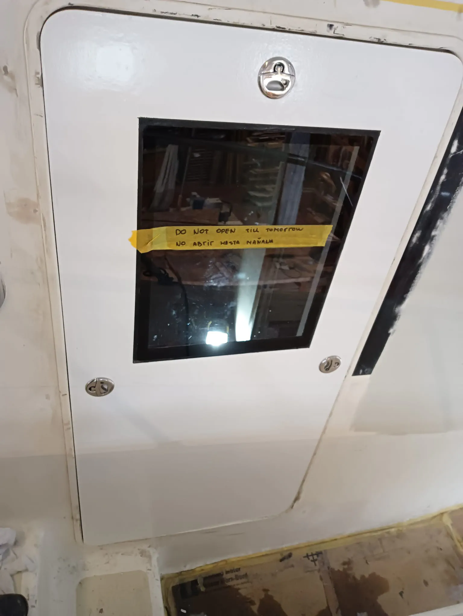 Reconstructed Aft Door Rebuilt wooden door with a methacrylate window.