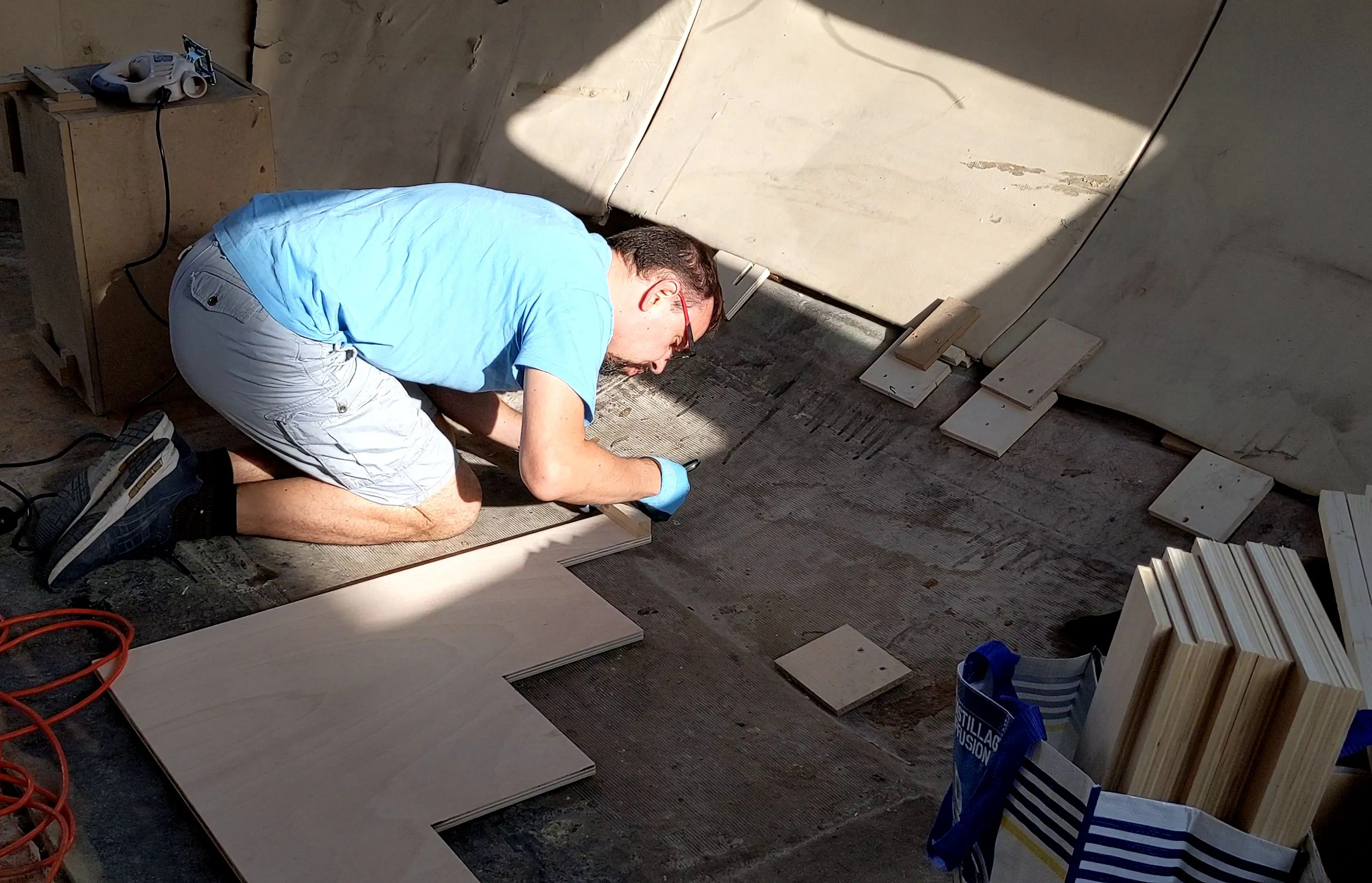 Assembling the marine plywood pieces of the stairs.