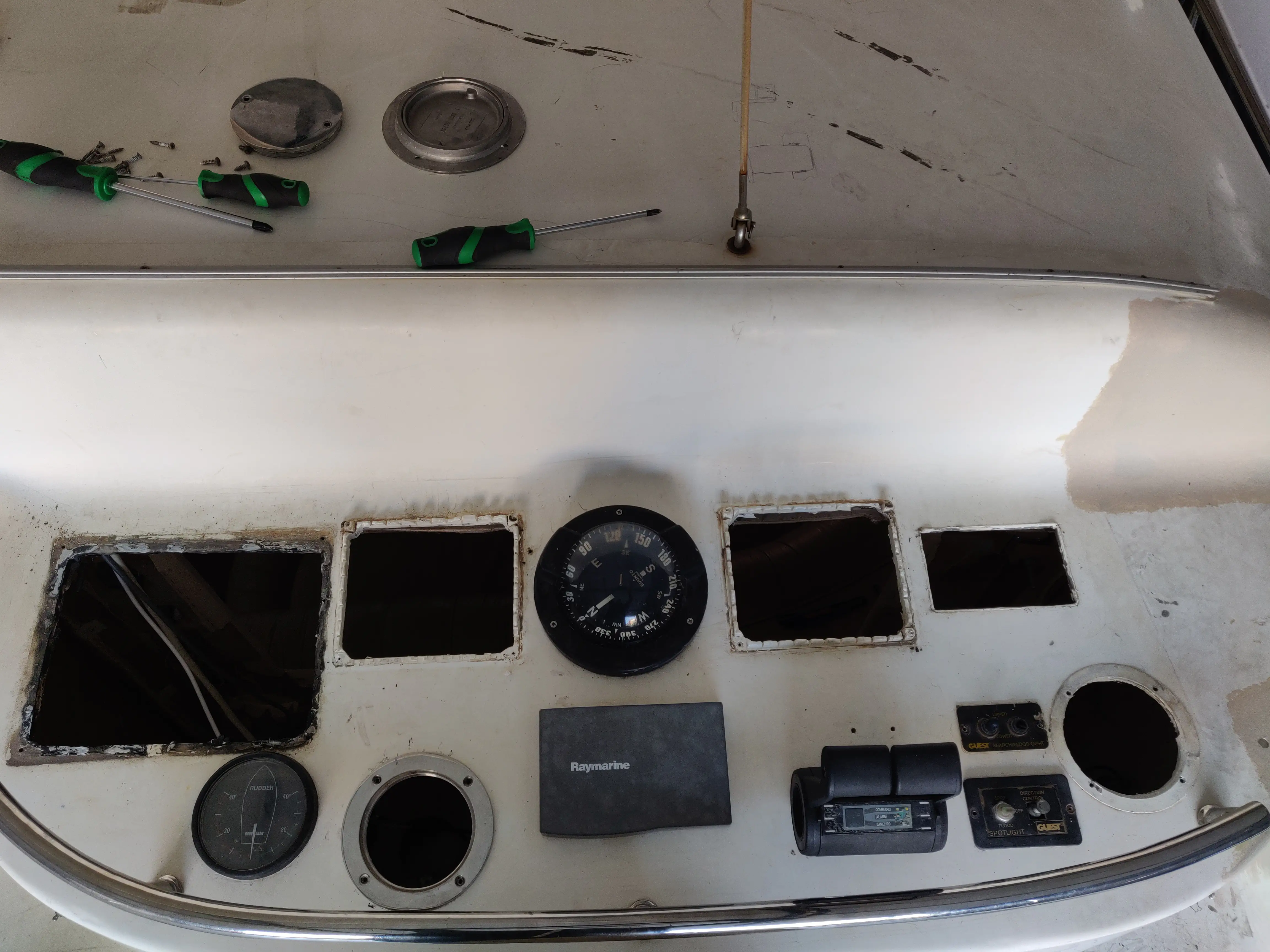 The flybridge helm, stripped down and ready for its modern transformation. The flybridge helm with all old instruments removed.