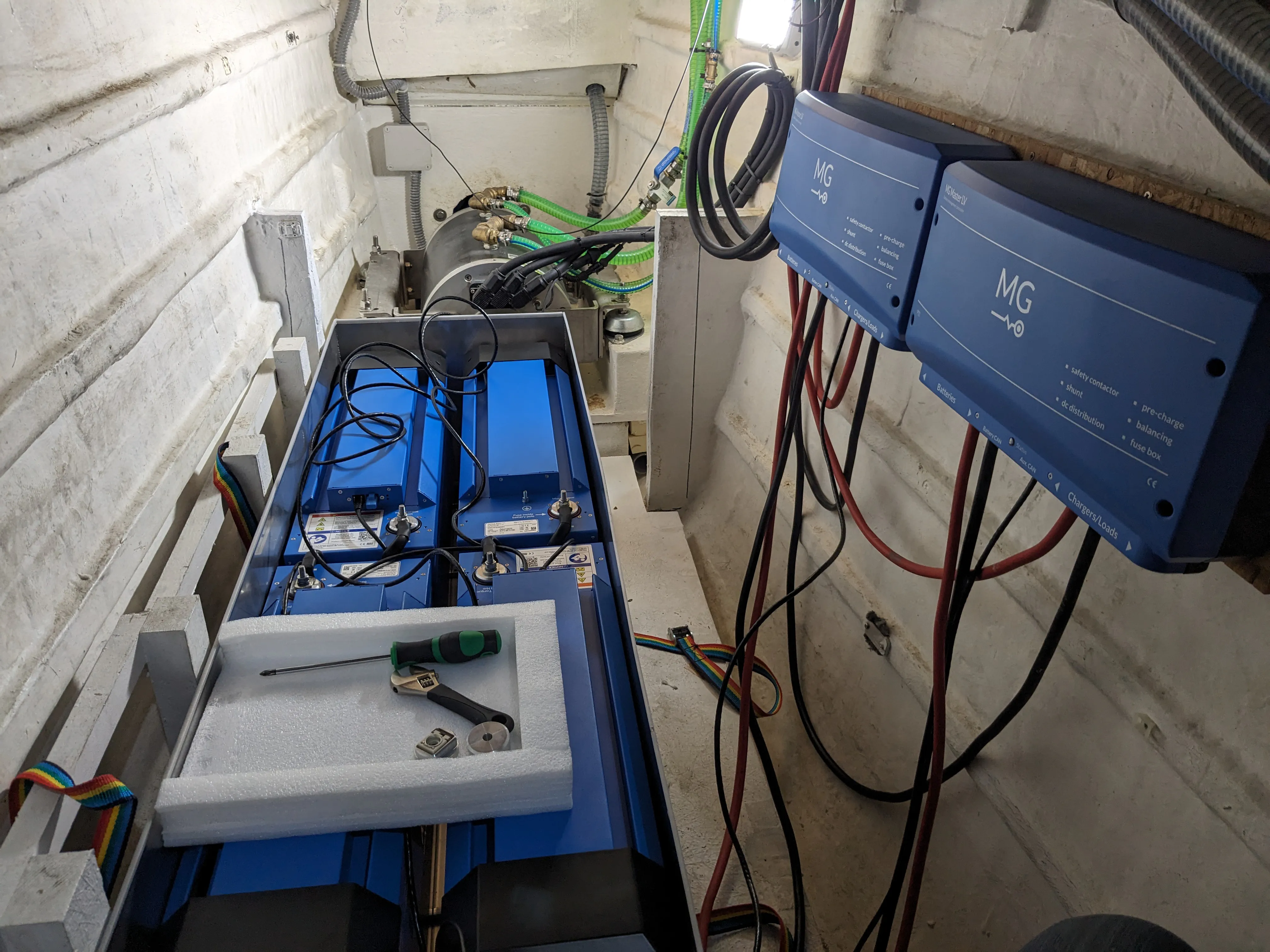 Port side battery installation in progress