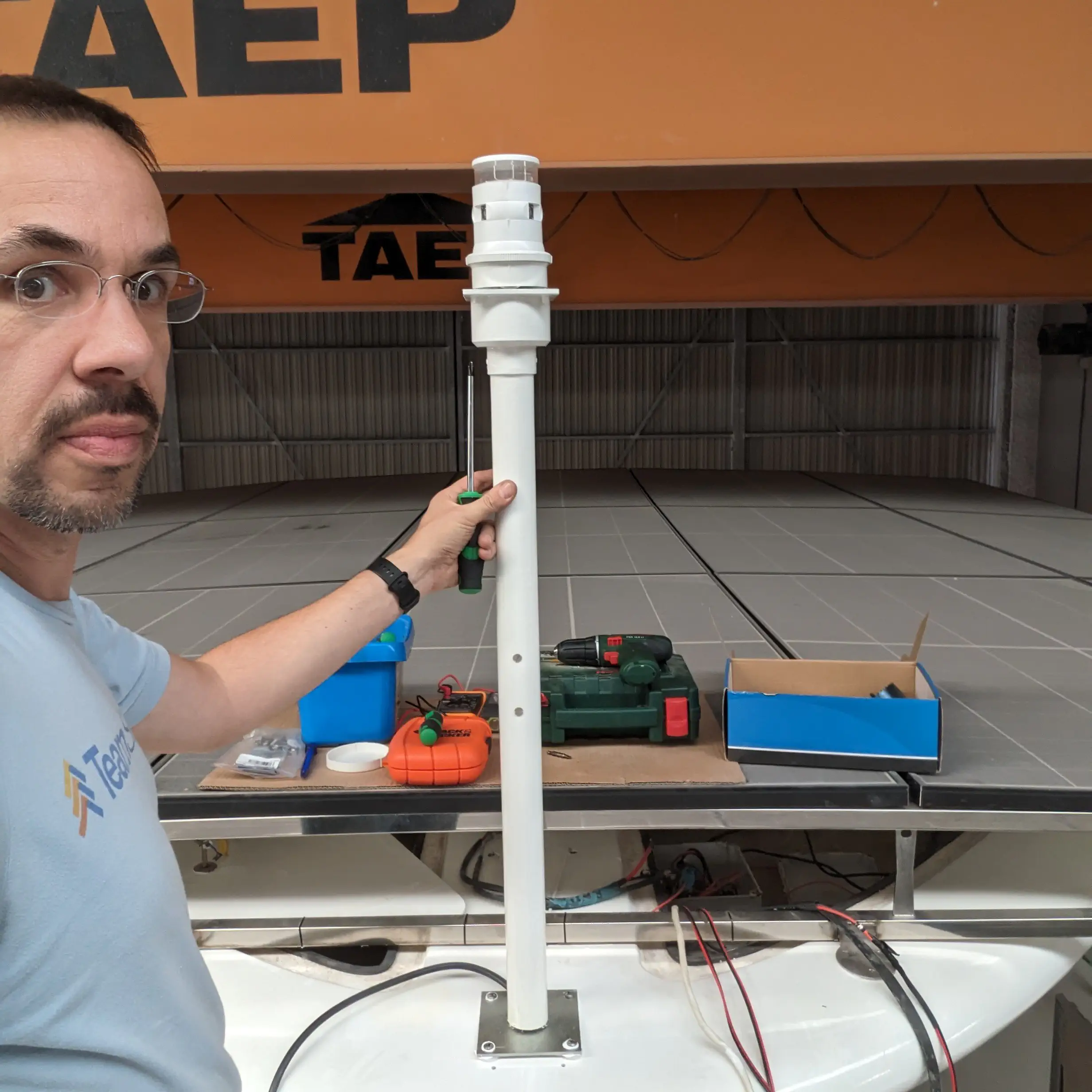 Painted mast with light installed