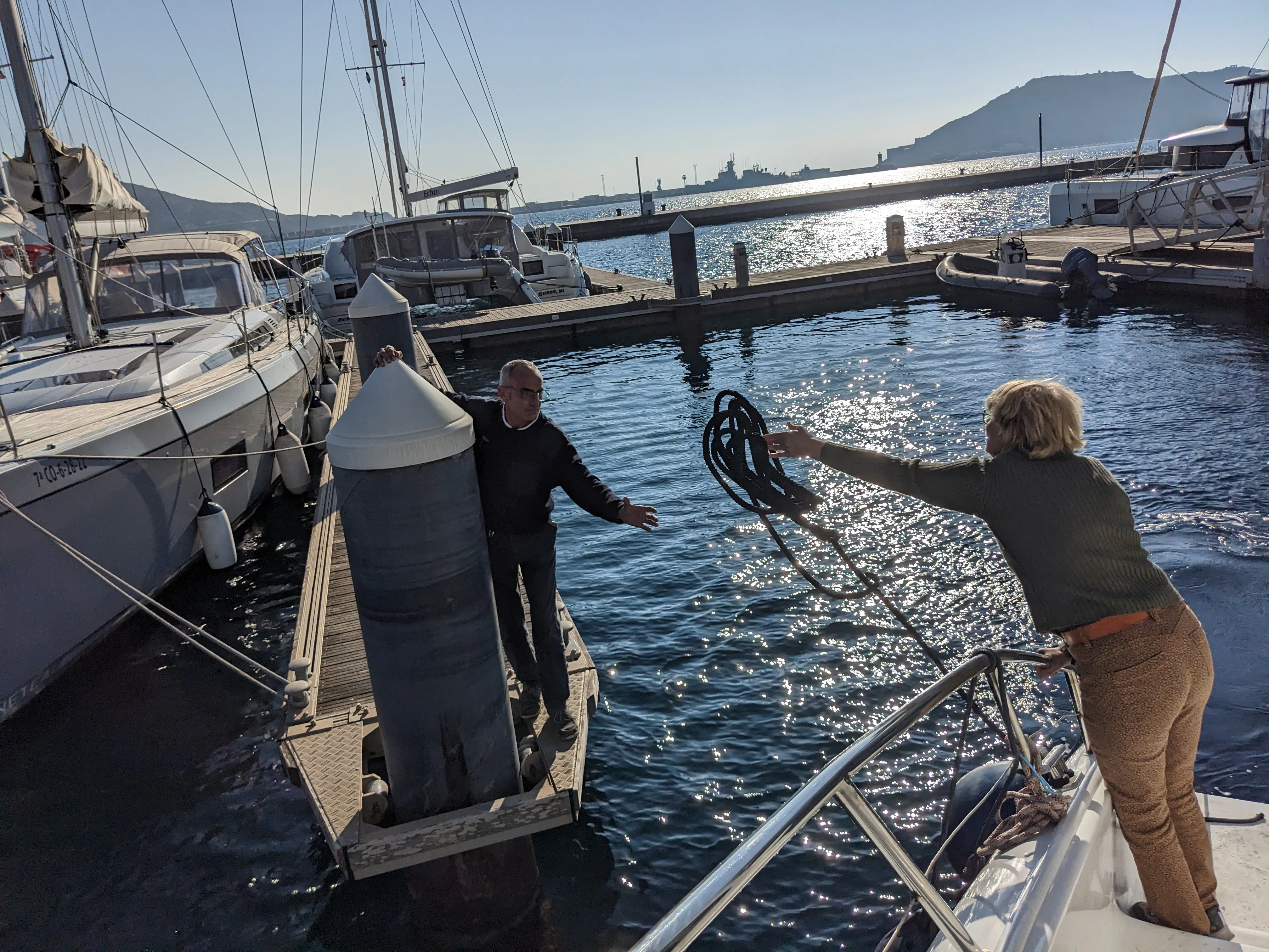 Back to Yacht Port Cartagena Yacht Port Cartagena marinero catching our mooring line