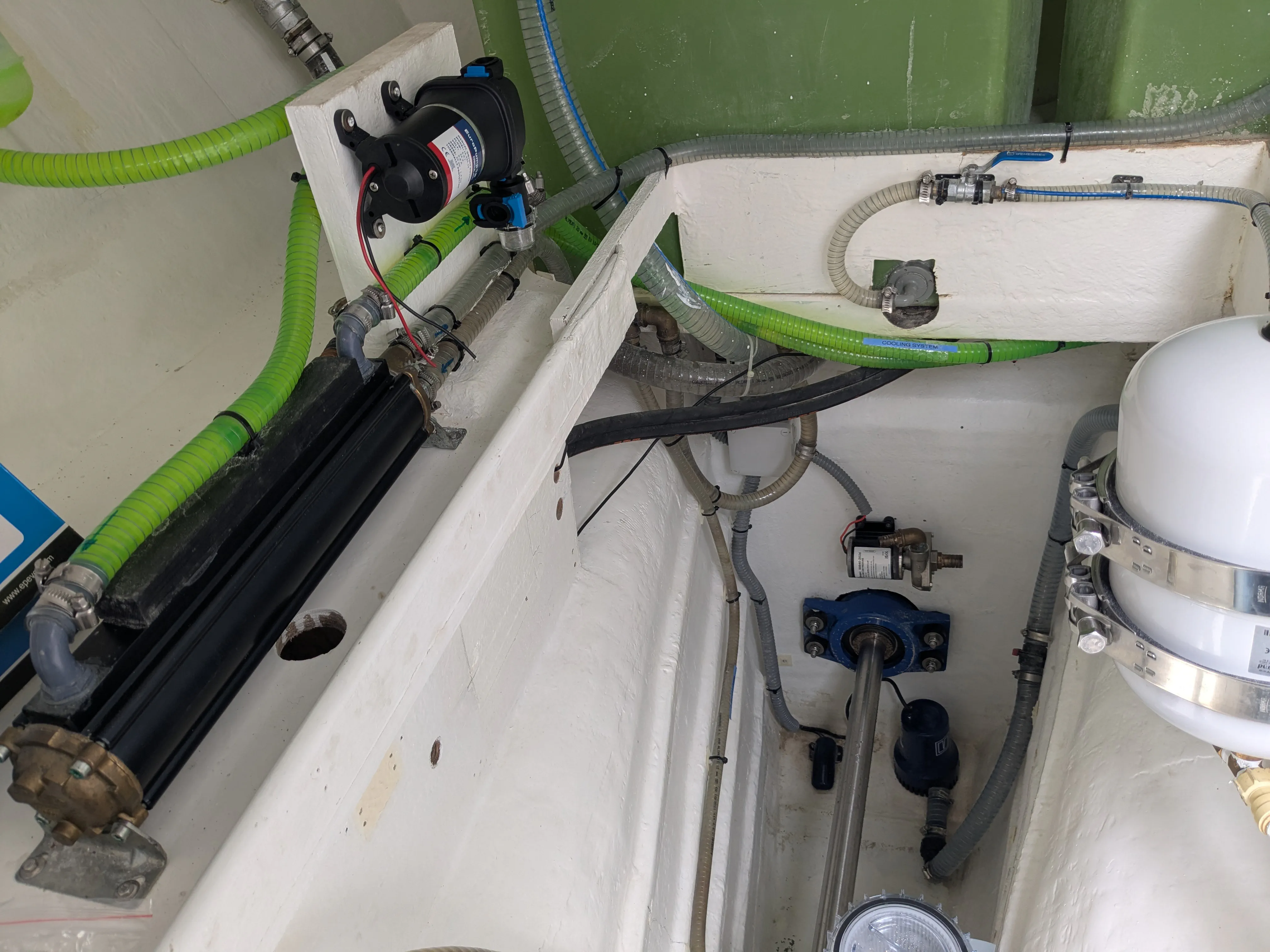 Cooling System Maintenance Close-up of the technical work involved in replacing the cooling pump