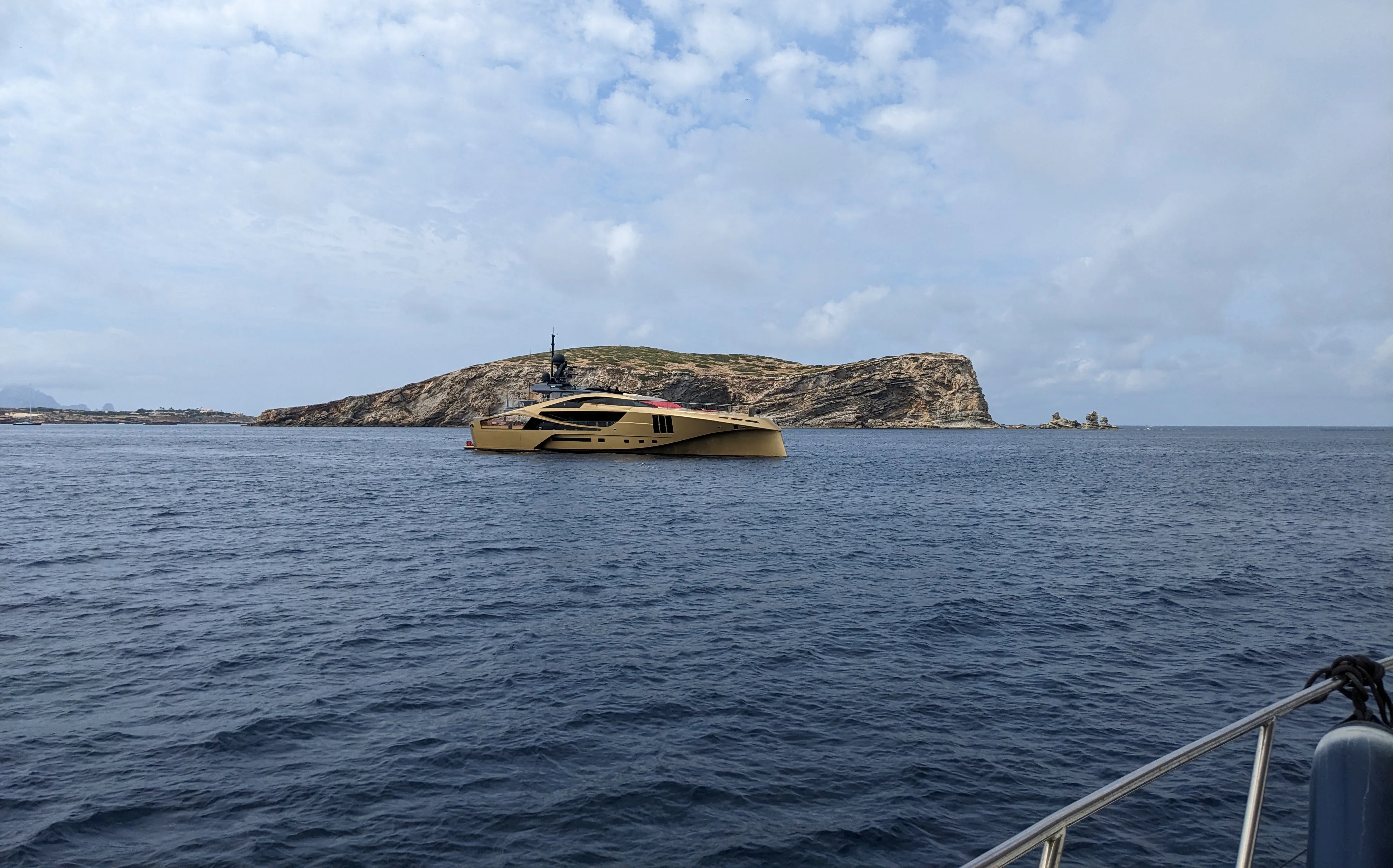 Superyacht Khalilah The distinctive golden superyacht Khalilah near Ibiza