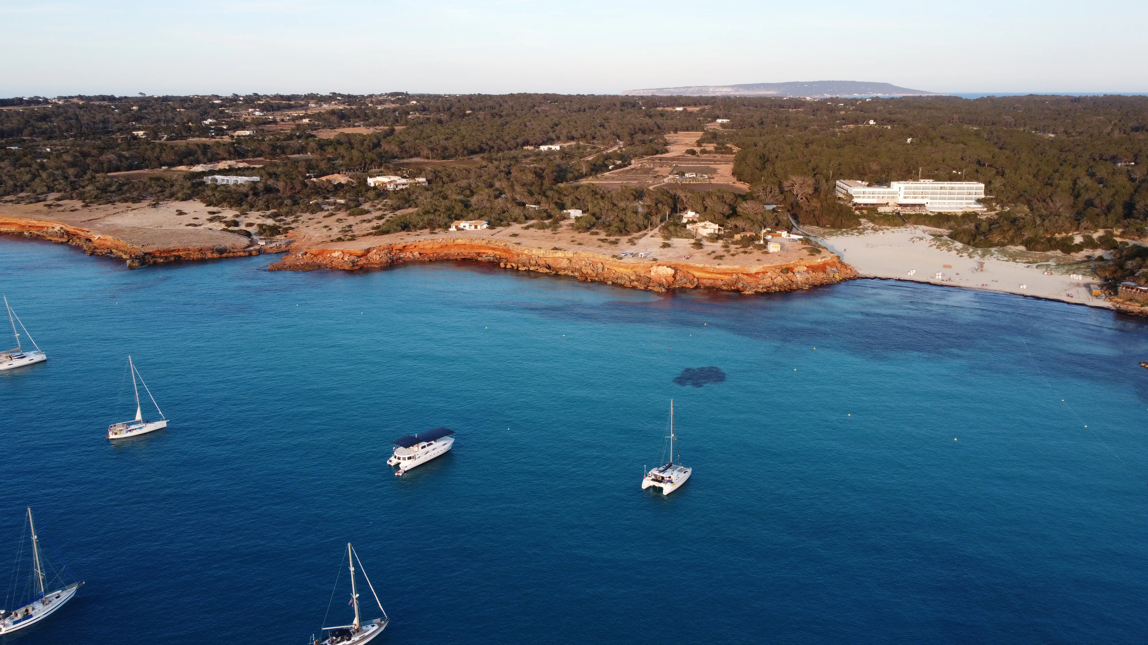 Cala Saona from Above Aerial drone shot of the turquoise waters in Cala Saona
