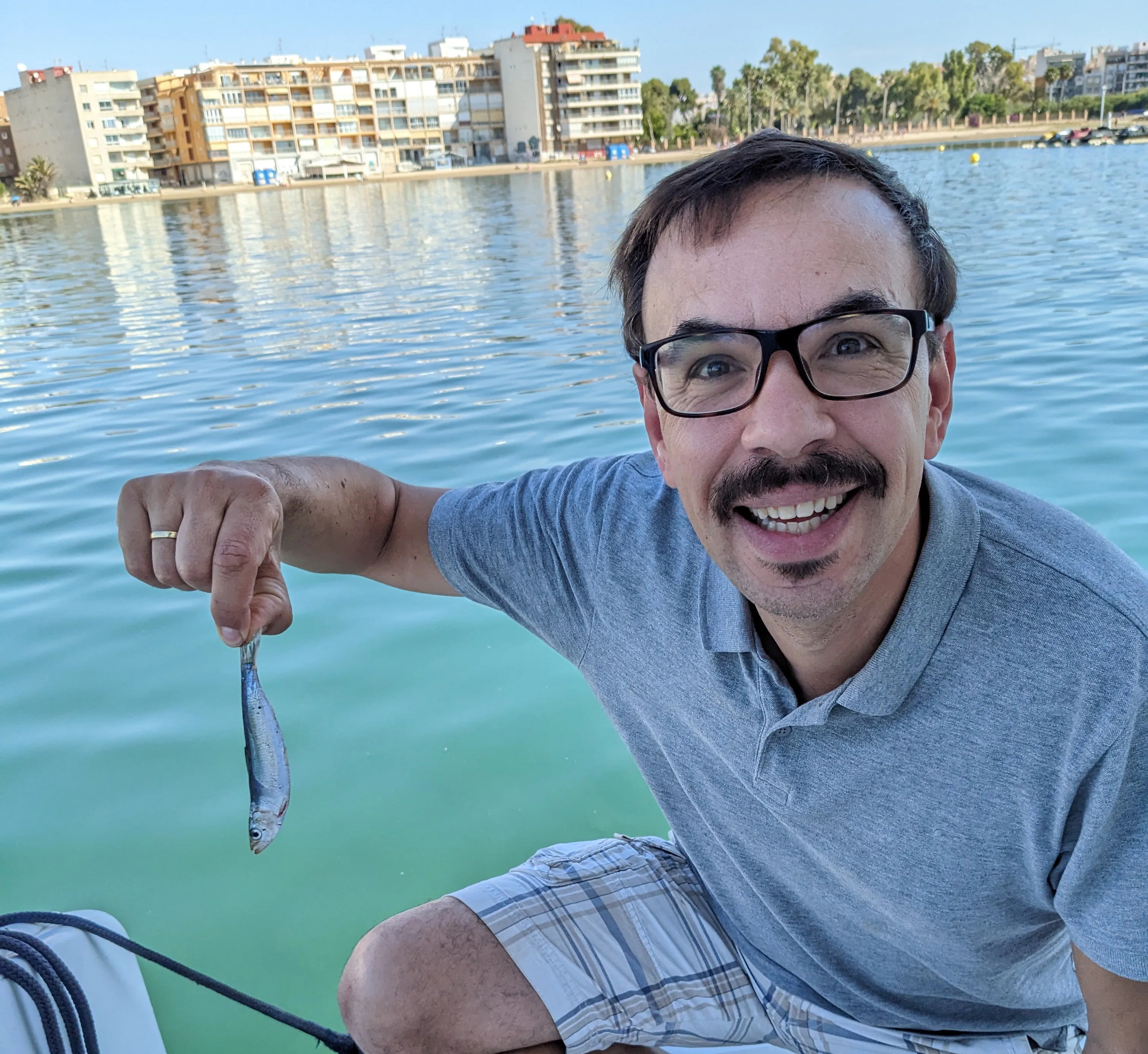 The Season's Only Catch A small sardine found on the boat's swim platform
